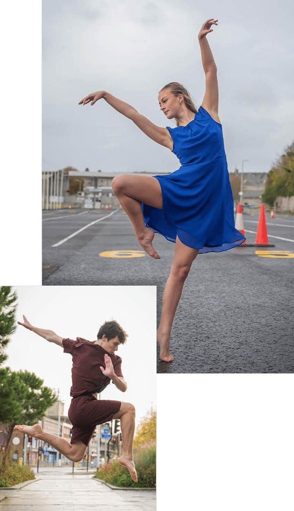 Dance Classes Plymouth - A female dancer in blue posing elegantly on a road and a male dancer leaping in a street dressed in brown.